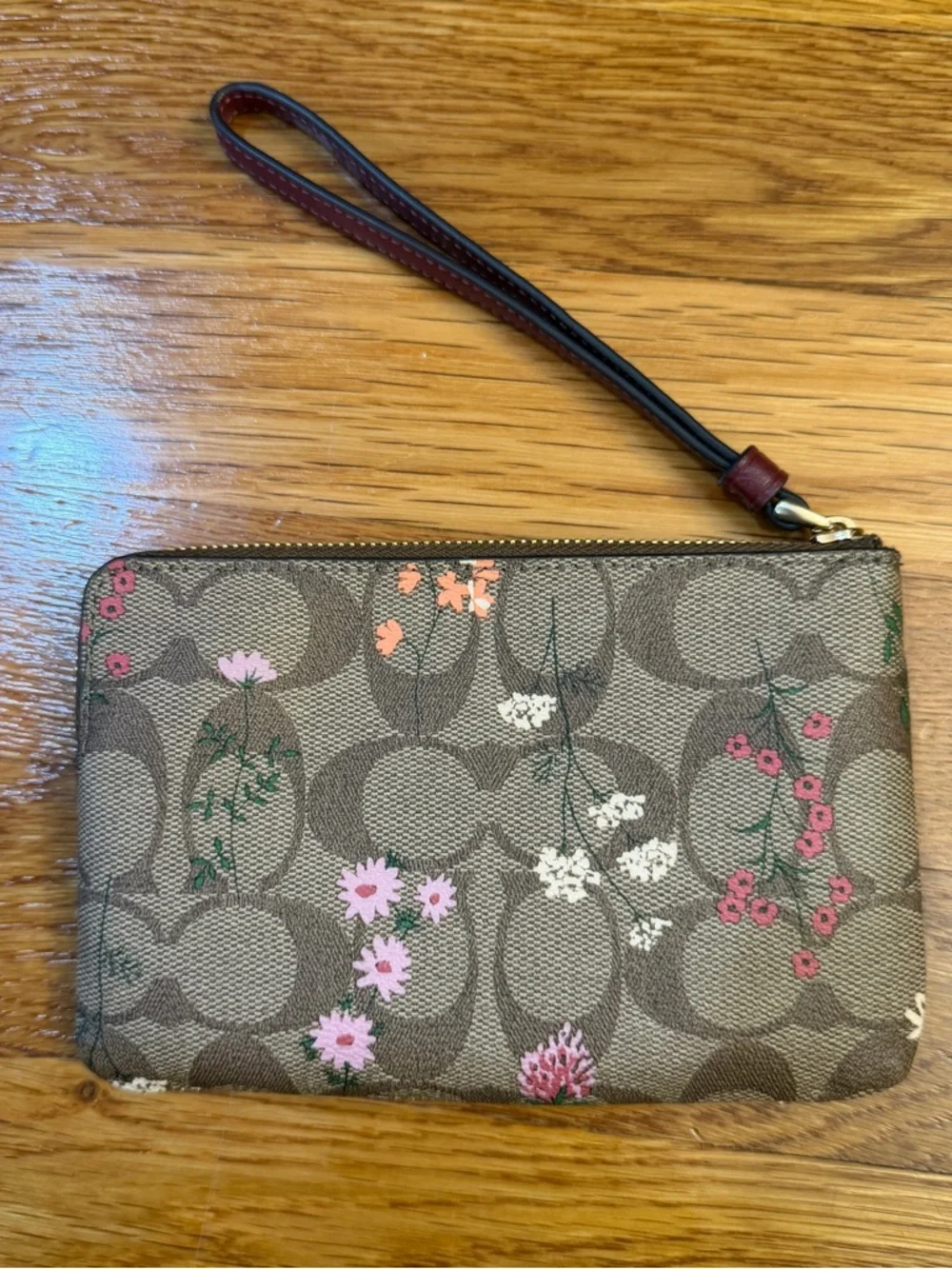 Coach Corner Zip Wristlet In Signature Canvas With Wildflower Print